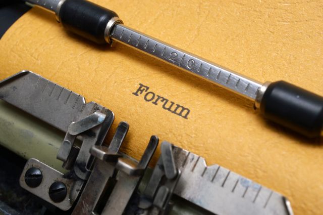 Forum text on typewriter